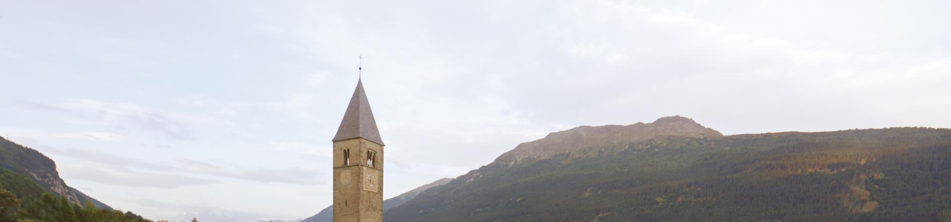 reschensee-turm-im-wasser-vinschgau-fb[2]